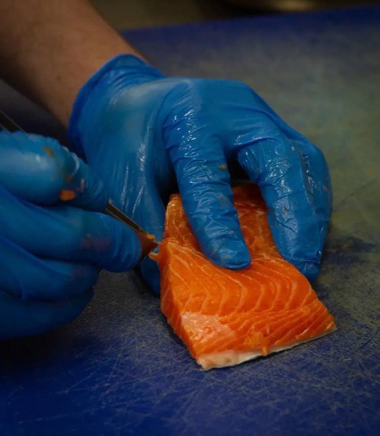 Crown and Castle, chef prepping salmon